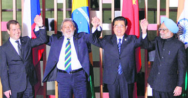 (From right) PM Manmohan Singh with Chinese President Hu Jintao, Brazils President Inacio Lula da Silva and Russian President Dmitry Medvedev at the BRIC Summit in Brasilia.