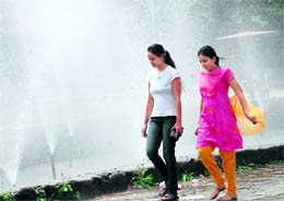 Sprinkle from this fountain at Panjab University provides a welcome relief from the sweltering heat