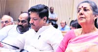 Ambika Soni, Prithvi Raj Chauhan (centre) and Shiv Shankar Menon at Vigyan Bhawan in New Delhi on Monday.