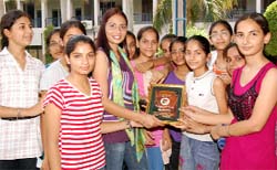 Participants presenting memento to Chandigarh model Harsimrat during summer camp in Abohar on Thursday