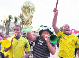 South African fans enter the Soccer City stadium to watch the World Cup match between SA and Mexico on Friday.