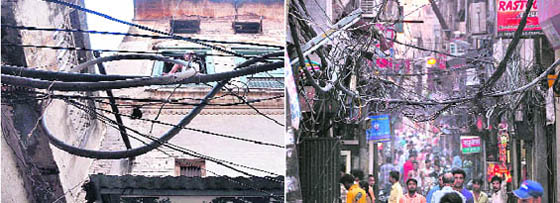 A network of electricity wires in a congested area near Purana Bazar poses a threat to residents.