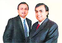UNITED THEY STAND: Anil and Mukesh, along with their families, revisited the same lodge at the Kruger National Park in South Africa, where their father had taken them in 2000