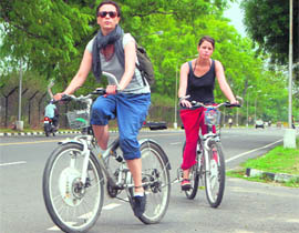 Foreigners hire bicycles from CITCO to take a view of the City Beautiful.