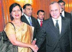Indian Foreign Secretary Nirupama Rao is welcomed by her Pakistani counterpart Salman Bashir in Islamabad on Thursday.
