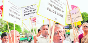 CITU activists protest against the hike in New Delhi on Friday. 