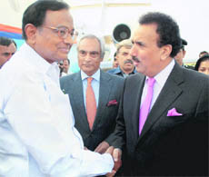 Home Minister P Chidambaram is welcomed by Pakistani Interior Minister Rehman Malik upon arrival at Chaklala airbase in Rawalpindi on Friday.
