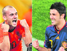 A combination of two pictures taken during the 2010 Football World Cup in South Africa in July 2010 shows (at L) Netherlands midfielder Wesley Sneijder and (at R) Spains striker David Villa, both celebrating after scoring a goal.