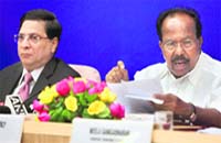 Union Minister of Law and Justice Veerappa Moily addresses a press conference in New Delhi on Sunday.