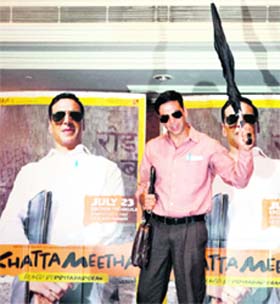 Bollywood star Akshay Kumar poses for photographers during a press conference of his upcoming film Khatta Meetha in New Delhi.