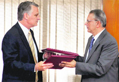 Home Secretary GK Pillai and US Ambassador to India Timothy J Roemer after signing the pact in New Delhi on Friday.