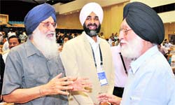 Sport Minister MS Gill with Chief Minister of Punjab, Prakesh SIngh Badal, as they attend the 55th National Development Council meeting in New Delhi on Saturday.
