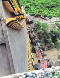 Four trucks plunge into a rivulet due to a bridge collapse on the Basantpur-Kingal stretch on the outskirts of Shimla
