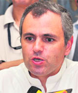Jammu and Kashmir CM Omar Abdullah addresses a press conference after meeting the Prime Minister in New Delhi on Monday.