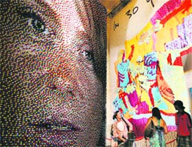 An art exhibition made out of push pins and post-it notes by artist Eric Daigh is seen on display at Grand Central Terminal in New York on August 4.
