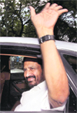 Kalmadi after attending the meeting with the PM. 