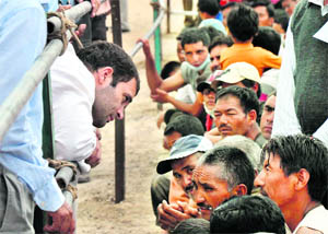 Rahul Gandhi meets flash flood victims at the Choglamsar Army relief camp in Leh on Monday. 