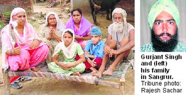 Gurjant Singh and (left) his family in Sangrur