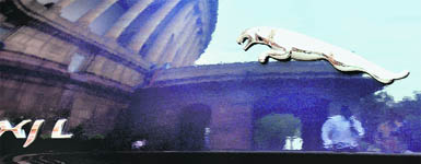Parliament House is reflected on an MPs Jaguar (Rs 1 crore plus segment). Such cars are a common sight during sessions.