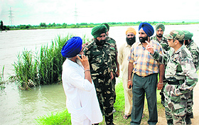 Sikh Regiment officials conduct a recce of the Sutlej river near Lodhipur in Anandpur Sahib district on Sunday.