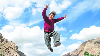 As classes resume in tents, this Class II student of the Government High School in Basgo village, some 45 km from Leh, has a spring in his step. 