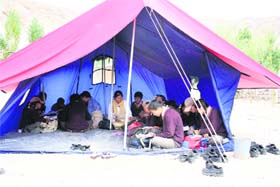 Students at a makeshift classroom in Leh