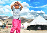 Three-year-old Staizing Thordot who lost his mother to the Leh flash floods.