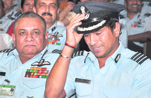 Sachin Tendulkar with IAF Chief of Staff PV Naik after getting an honorary rank of Group Captain in New Delhi on Friday.