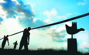 The blue sky forms the backdrop of these labourers heading home after a hard day’s work.