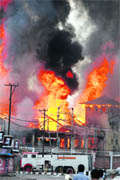 Government buildings set ablaze by protesters in Srinagar