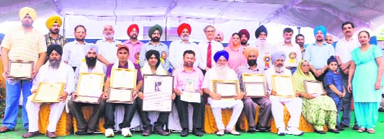 Progressive farmers with their awards at the Kisan Mela