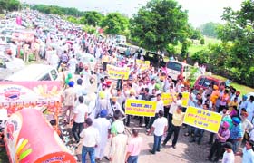 Veterinary doctors hold a protest during the Pashu Palan Mela