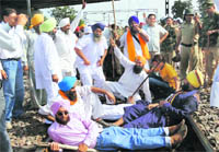 HSGPC protesters let off steam on a rail track in Kurukshetra