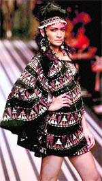 A model displays the collection by designer Malini Ramani during the grand finale of Lakme Fashion Week in Mumbai