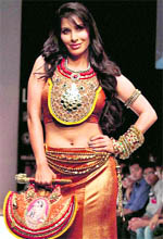 Bollywood actor-singer Sophie Chaudhary displays designer Malini Agarwala's creation