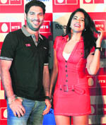 Bollywood actor Sameera Reddy with crickter Yuvraj Singh during the launch of Speed ka double dose, a joint initiative of MTS and Reebok in New Delhi