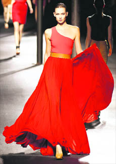 A model walks the ramp at Paris Fashion week.