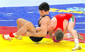 Sanjay beats Brian Richard Addinall of South Africa to win gold in 74-kg category.