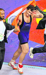 Wrestler Sanjay takes a victory lap