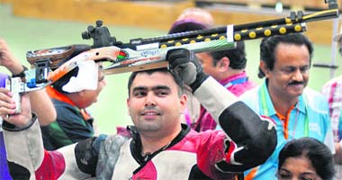 Gagan Narang celebrates after lifting the gold in the 10m air rifle (singles) at the CWG