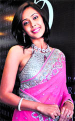 Bollywood actor and model Hrishitaa Bhatt wears a 'Million Euro Diamond Bustier', in Ahmedabad on Thursday