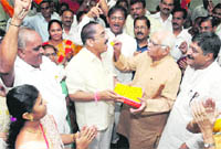 Is it shortlived? BJP leader Ram Naik and colleagues celebrate in Mumbai. 