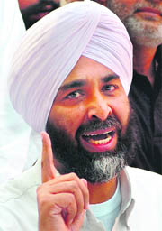 Manpreet addresses the media in Chandigarh.