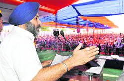 Punjab Deputy CM Sukhbir Badal addresses a gathering at a function near Malerkotla on Monday.