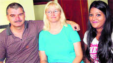 Laura Schmid with her parents Rene Schmid and Hilla Schmid.