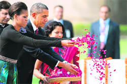 Obamas at the Rajghat in New Delhi on Monday