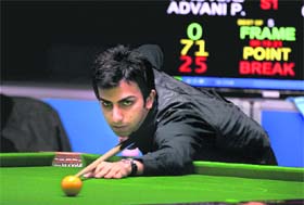 Pankaj Advani plays a shot during the finals of mens english billiards singles event of the 16th Asian Games in China