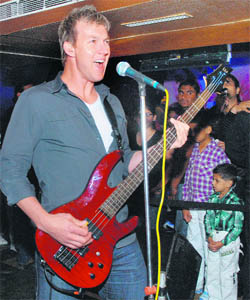 Australian cricket star Brett Lee performs along with his band (White Shoo Theory) at a discotheque in Chandigarh on Friday.