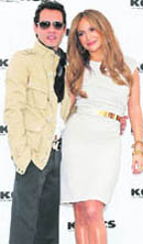 Marc Anthony (L) and his wife Jennifer Lopez pose at a news conference to announce 'The Jennifer Lopez and Marc Anthony' collections in partnership with Kohl's department stores at The London West Hollywood hotel in West Hollywood, California'. Kohl's will be the exclusive provider of the contemporary lifestyle brands in the U.S. and it will be available nationwide in Fall 2011 beginning with women's and men's apparel and accessories