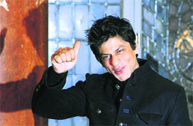 Actor Shah Rukh Khan poses after signing the guest book of Berlin in the city's Rote Rathaus town hall, on Tuesday. Khan shot part of his latest movie Don II in Berlin.
